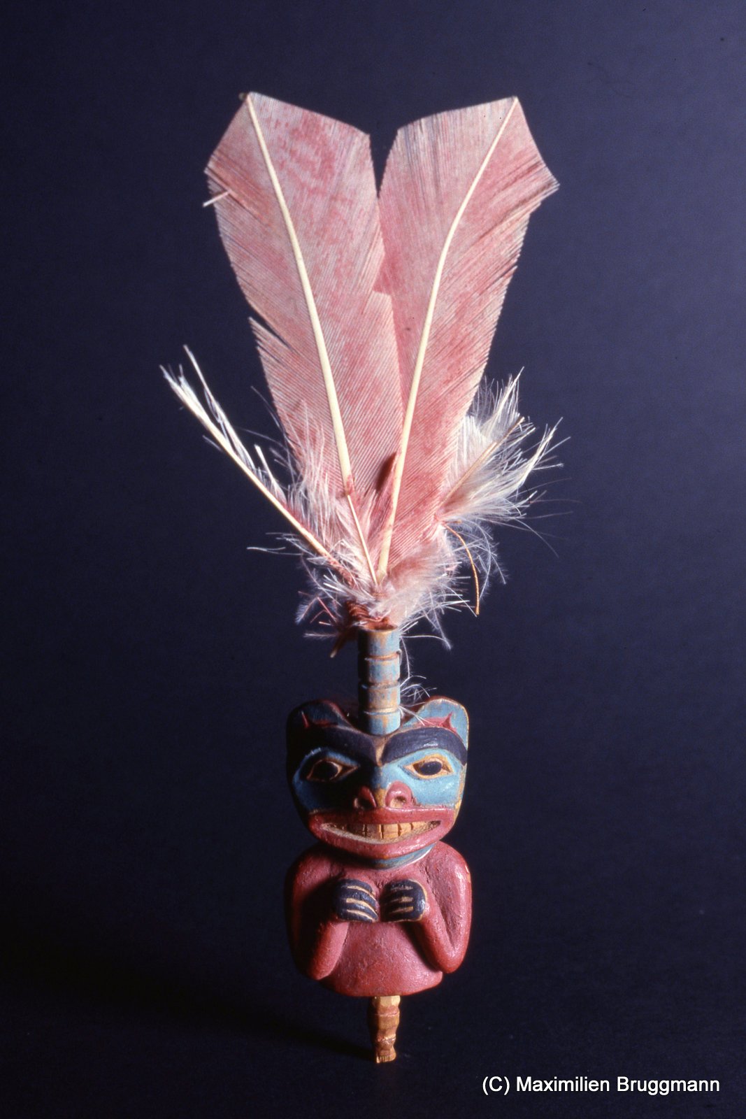 18 This small bear figurine with its four "potlatch rings" was probably part of a larger headdress at one time. (Figure 18 cm; SJM)